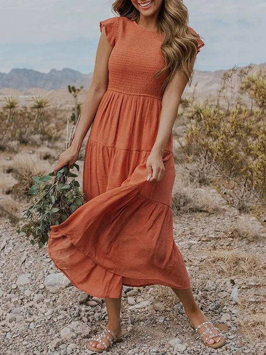 Orange Sommerkleid für Damen mit Rüschendetails und praktischen Taschen